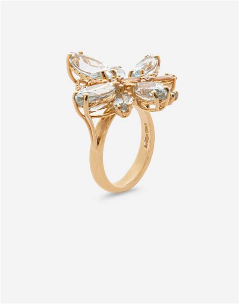 Spring ring in yellow 18kt gold with aquamarine butterfly